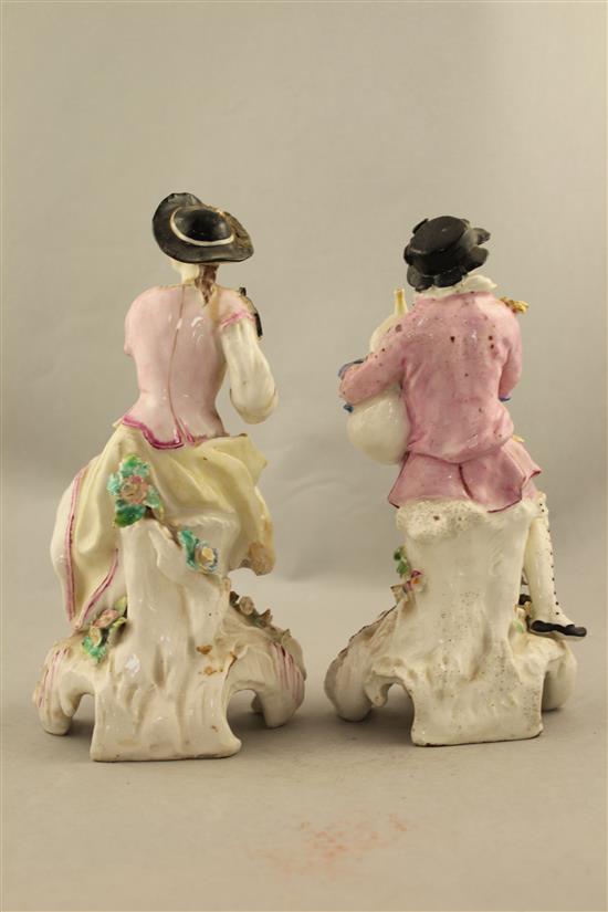 A pair of Chelsea-Derby figures of musicians, c.1775, 21.5cm, restorations